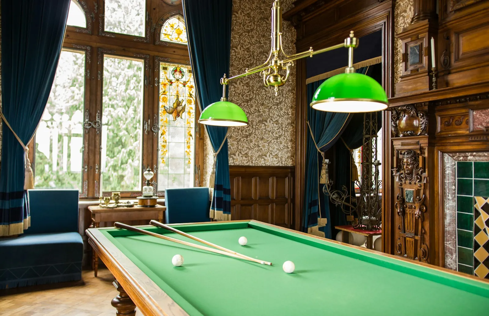 Illustrative stock photograph of a green billiards table in a wood-panelled room