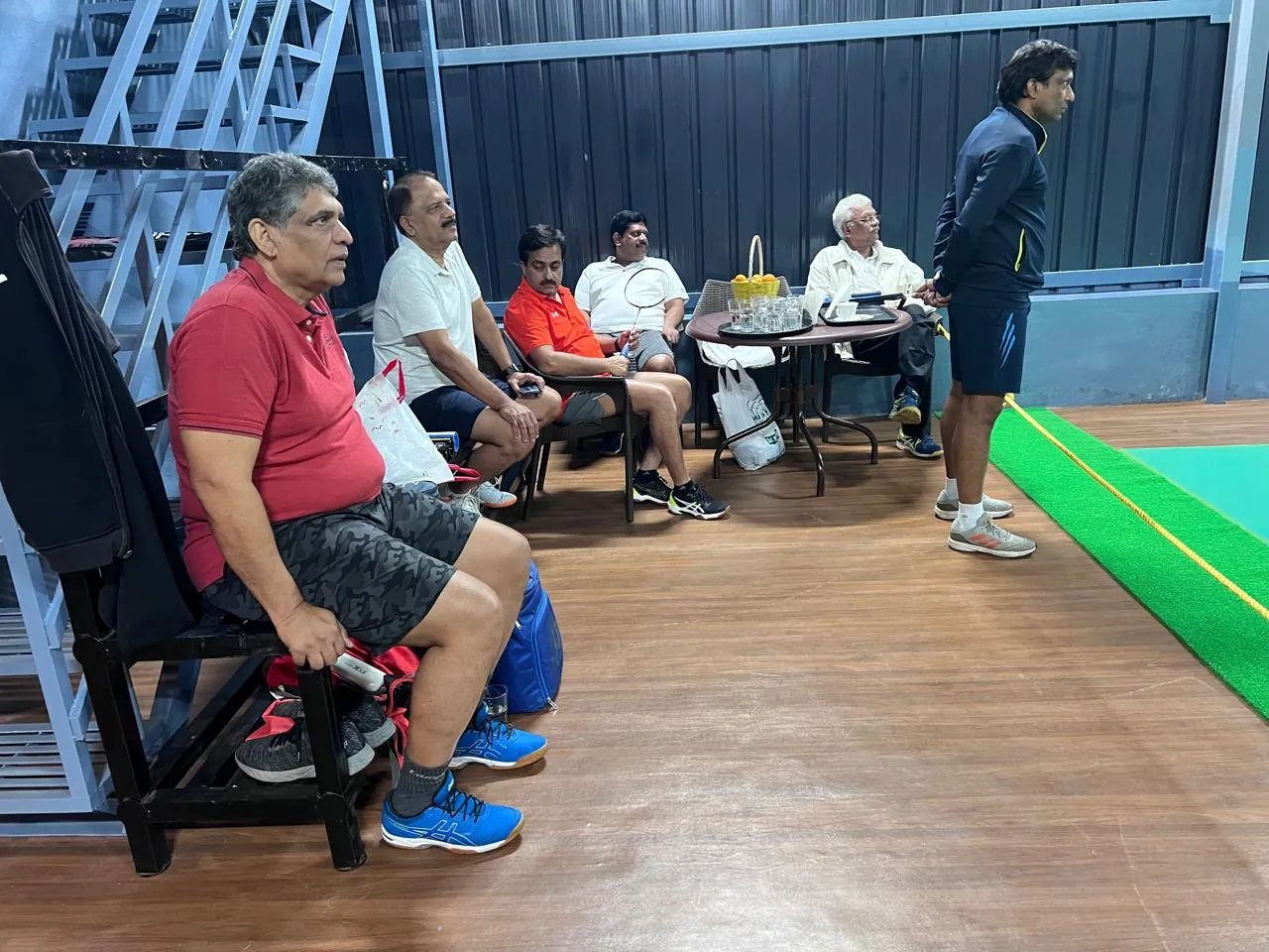 Members relaxing in the sports lounge beside the indoor court
